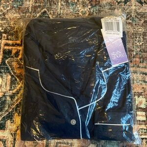 NWT target stars above pajama set. Short sleeve top and pant bottom, size large